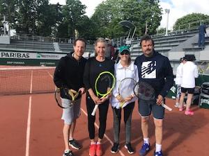 Shanna and I getting lesson from Henri Leconte at the 2019 French Open!