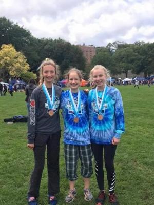 Left to Right: Yeva, Emma Jane and Anna at Manhattan HS XC Invite 2019